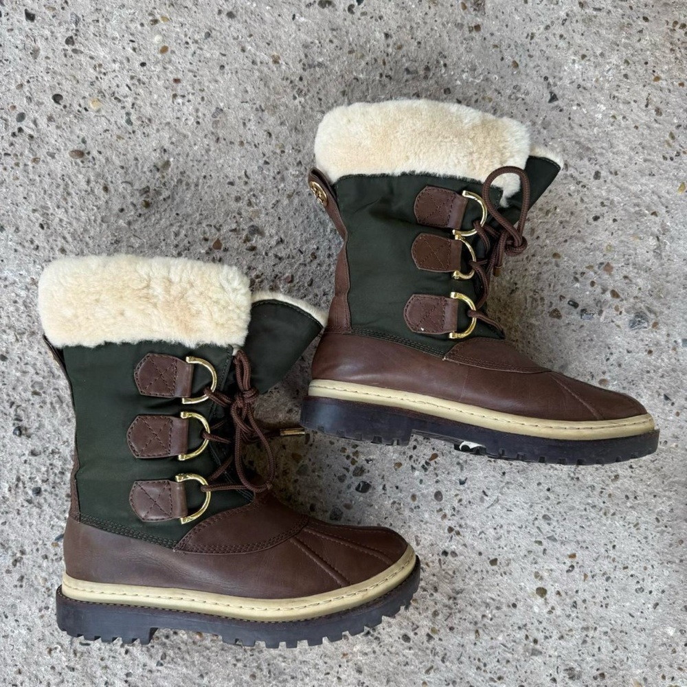 Tory Burch duck boots with green nylon, brown leather, and shearling fur lining.